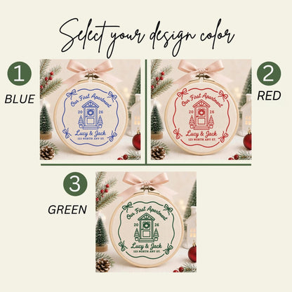 May include: Three circular embroidery hoops featuring a house door design with the text 'Our First Apartment', '2026', 'Lucy &amp; Jack', and '123 North Any St.' The designs are available in blue, red, or green, each topped with a light pink ribbon bow.