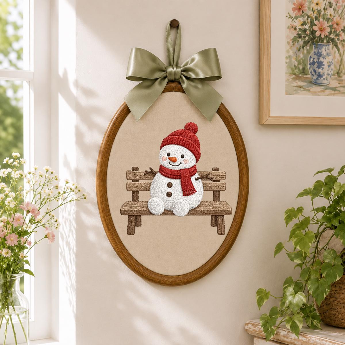 Embroidered Snowman Sitting on Wooden Bench Oval Hoop Decor, Cozy Winter Christmas Wall Hanging Sign, Cute Holiday Nursery Gift