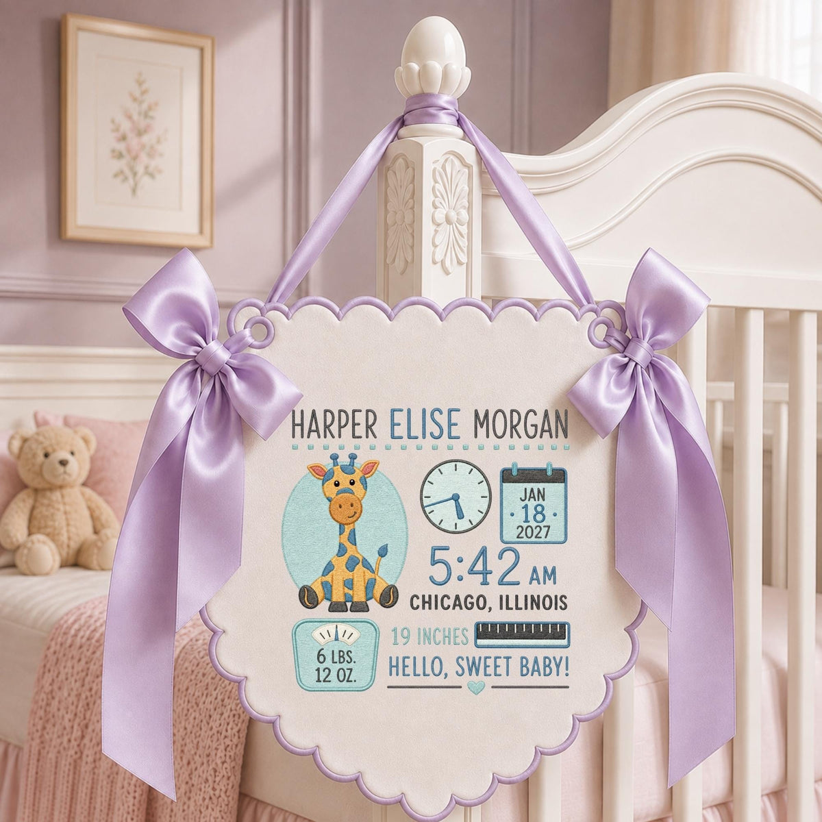 May include: A white scalloped wall hanging featuring a cartoon giraffe, a clock showing 5:42 AM, a calendar for Jan 18, 2027, and text reading Harper Elise Morgan, 6 lbs. 12 oz., 19 inches, Chicago, Illinois, and Hello, Sweet Baby, with lavender ribbons.