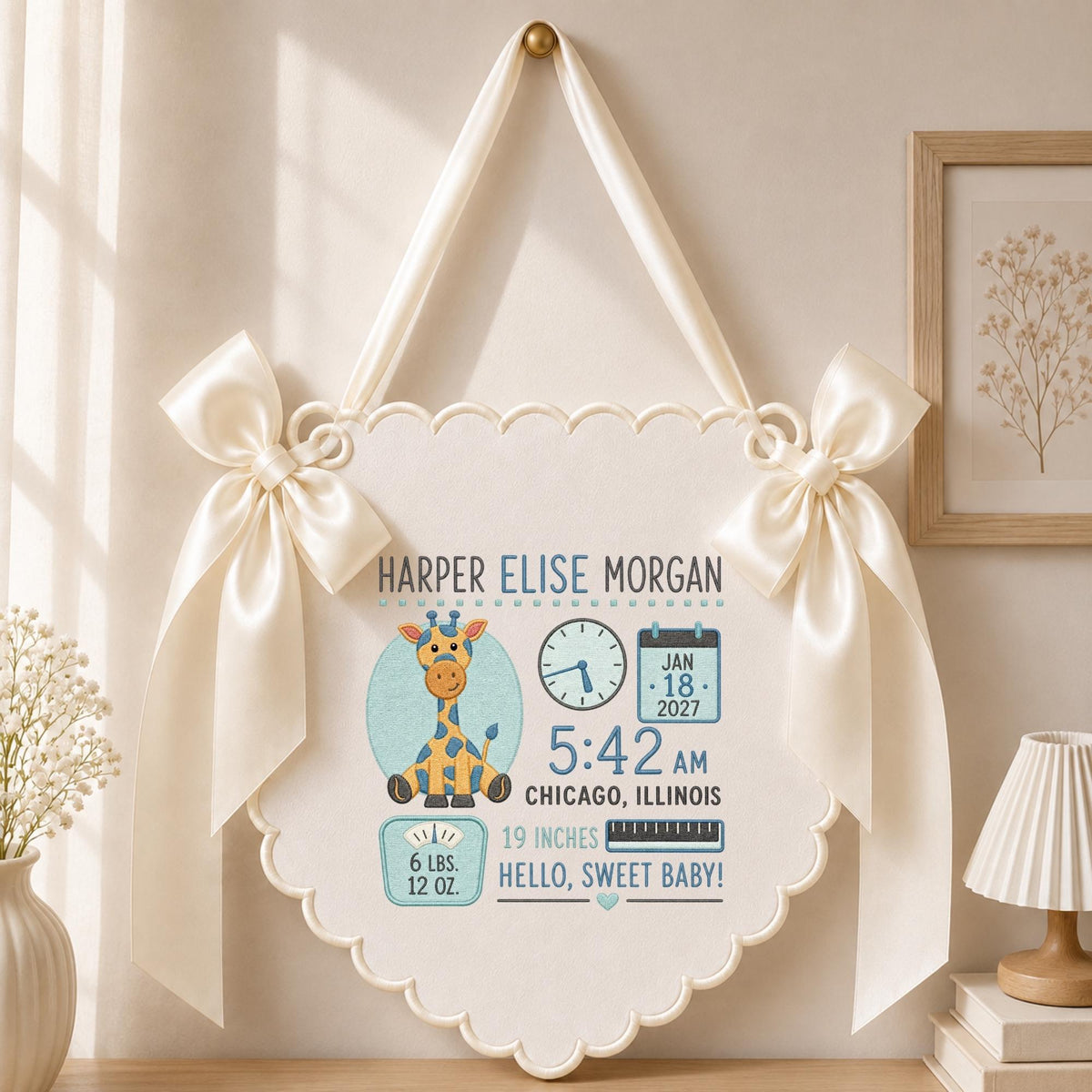 May include: A cream-colored scalloped wall hanging featuring a giraffe illustration and birth details for Harper Elise Morgan, including the date Jan 18, 2027, time 5:42 AM, location Chicago, Illinois, weight 6 lbs. 12 oz., and length 19 inches.